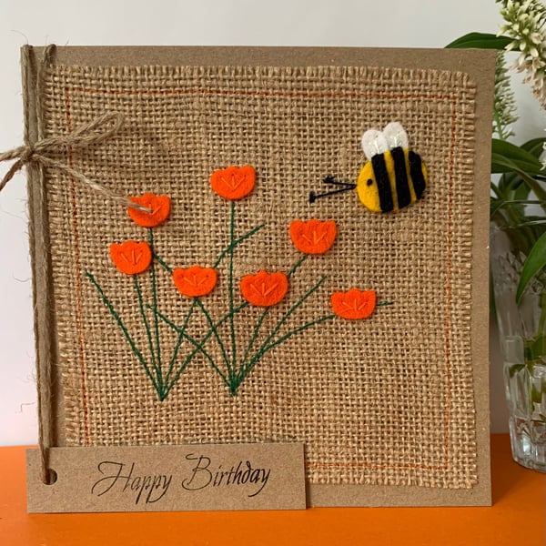 Handmade Birthday Card. Bright orange flowers with a bee from wool felt. 