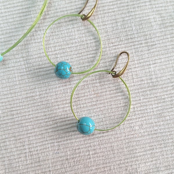 Green paint wire with turquoise bead.