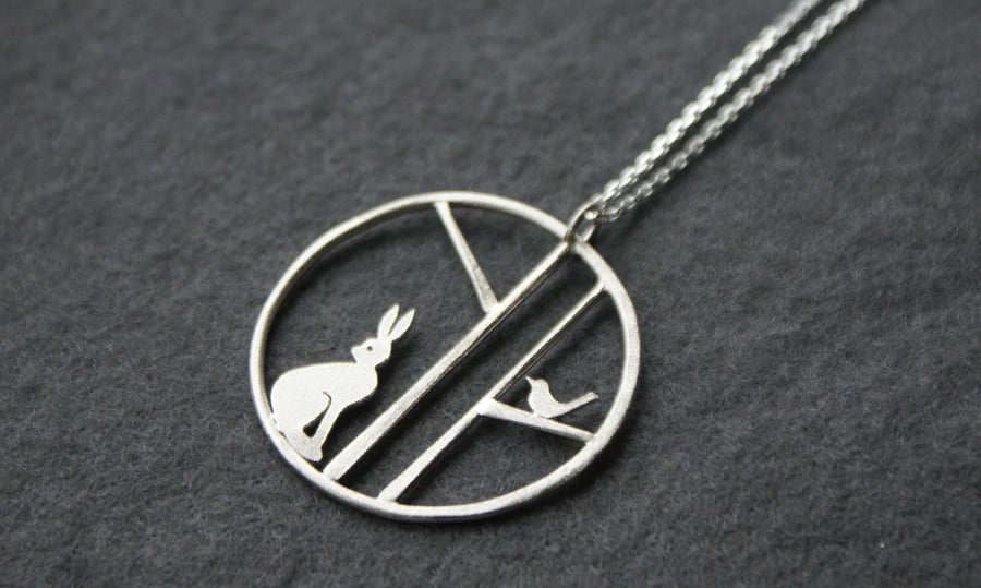 Edge of the woods hare and bird necklace
