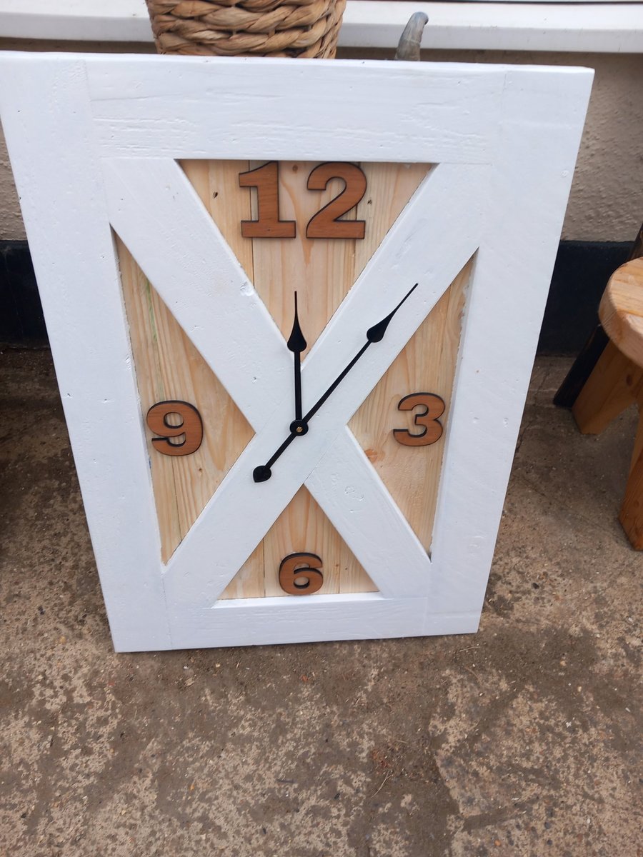 Barn door style wooden wall clock