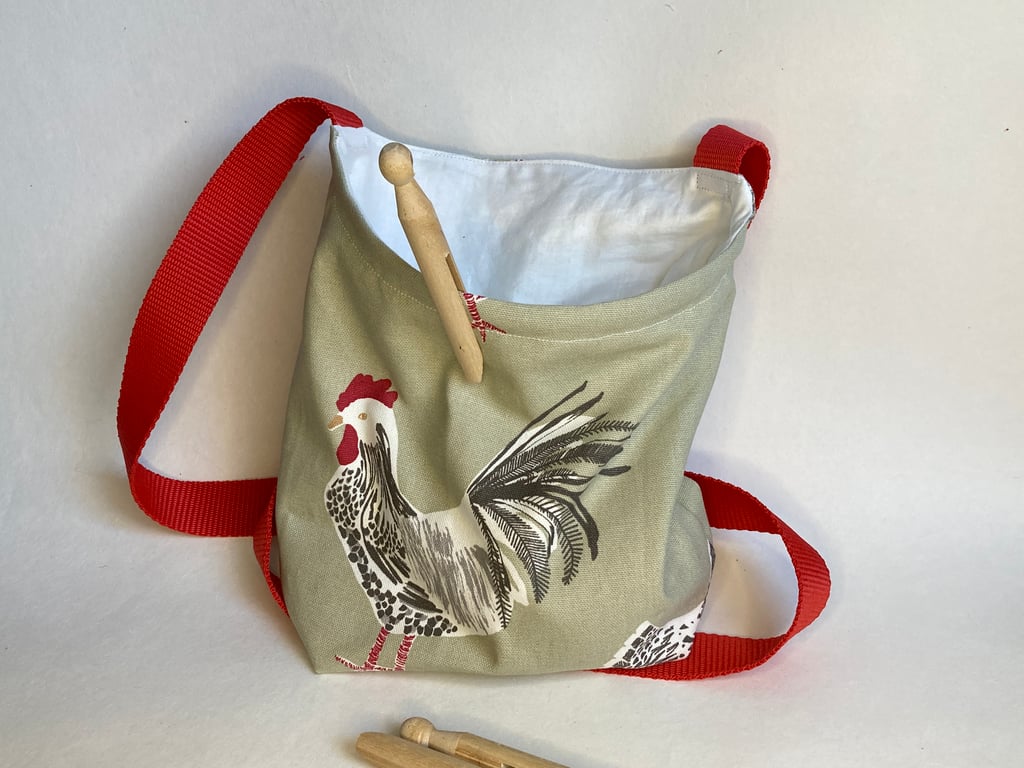 Cross-body style peg bag in sage green chicken fabric