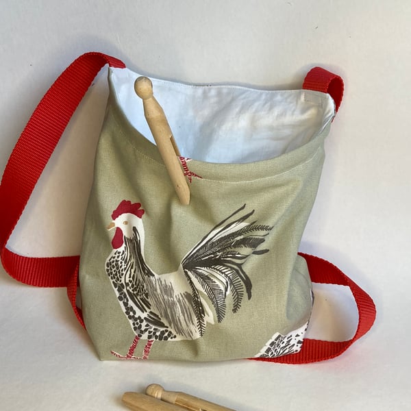 Cross-body style peg bag in sage green chicken fabric