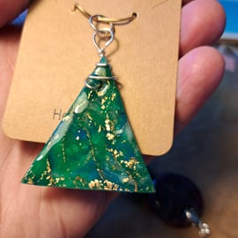 Dark green sparkly triangular shaped pendant 