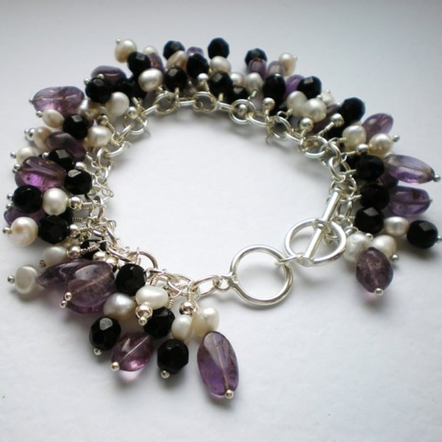 Sterling Silver and Amethyst charm bracelet