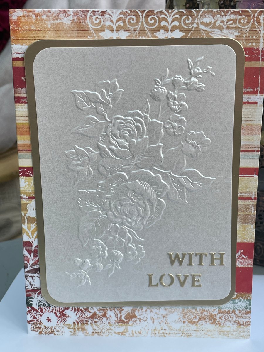 Beautifully embossed rose spray with love card