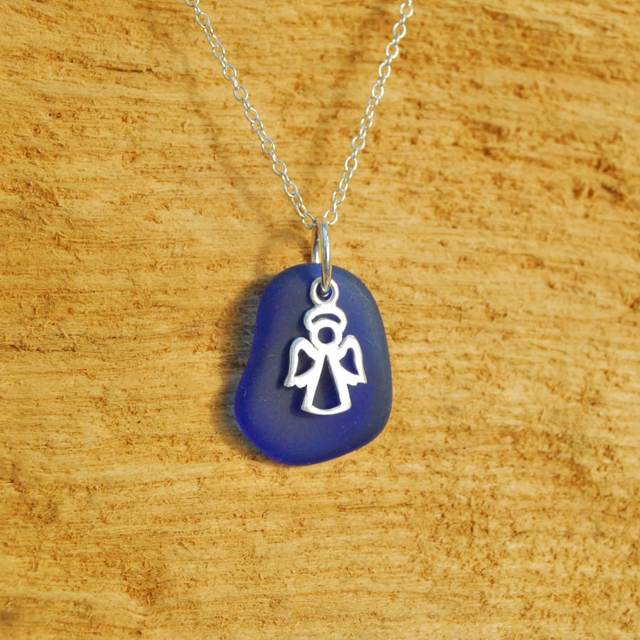 Blue beach glass pendant with angel charm