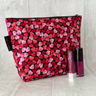 Makeup bags , hearts on black 