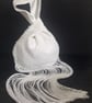 White sequin Japanese Knot bag with 29cm tassel trim and satin lining.