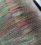 Hand woven art yarn scarf in green and purple - Image 6