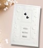 Handmade Wedding Card with 2 Silver Heart studs on embossed card