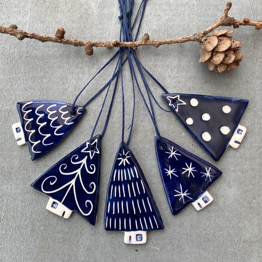 Set of five  ceramic Christmas tree decorations 