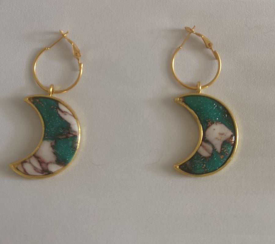 Beautiful moon shaped earrings 