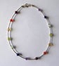 Sterling Silver and Gemstone Anklet with Rainbow coloured Chakra Crystals - Image 1