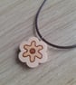 Pyrography Daisy Pendant Necklace: Wooden Flower, Waxed Cord necklace.