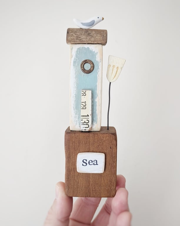 Tall Wooden Sea Hut with Clay Flower and Seagull 'Sea'