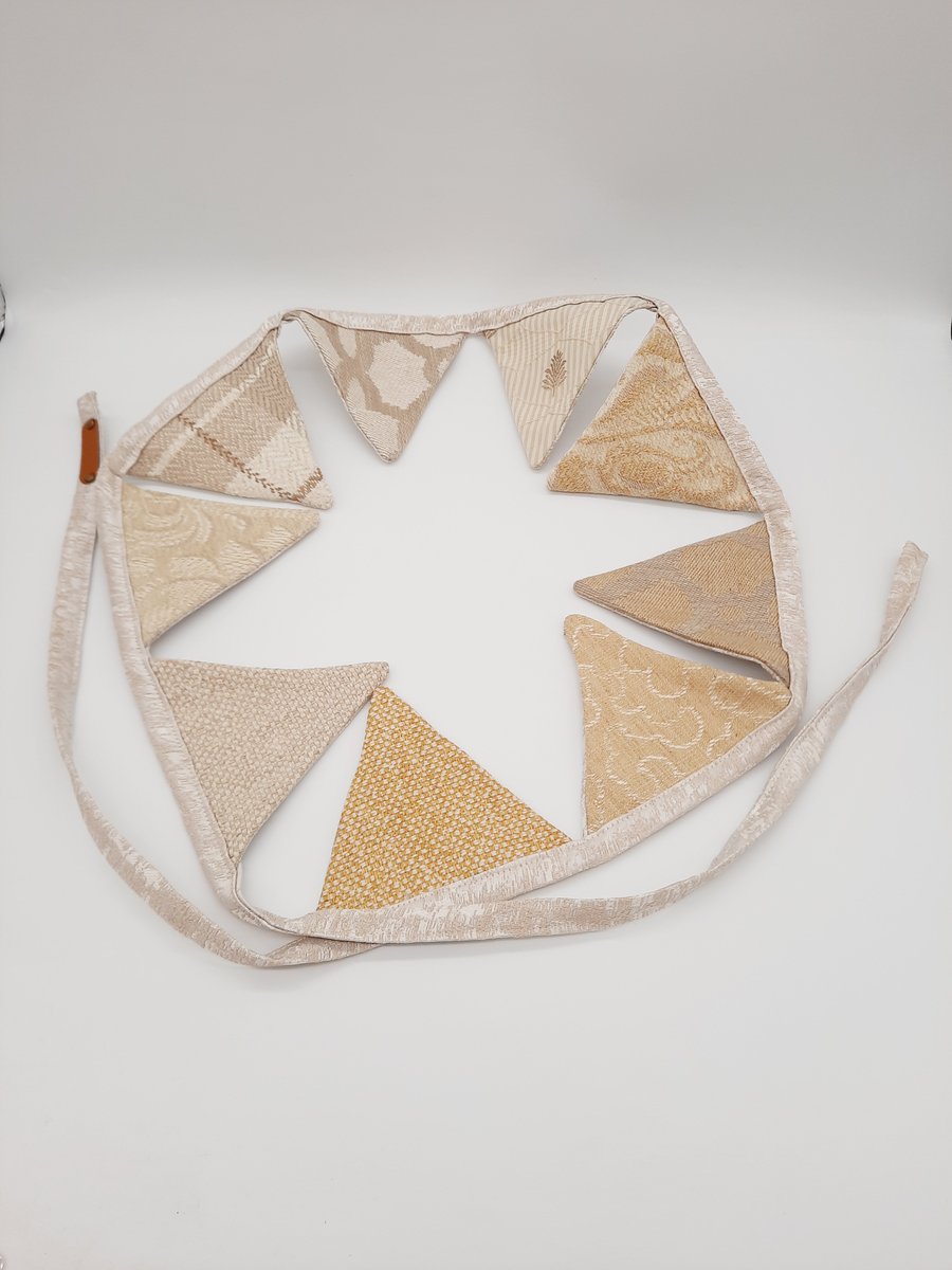 Golden yellow,  cream and sand themed mini bunting. 