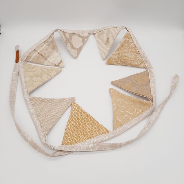 Golden yellow,  cream and sand themed mini bunting. 