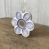Intricate ceramic flower decoration lilac