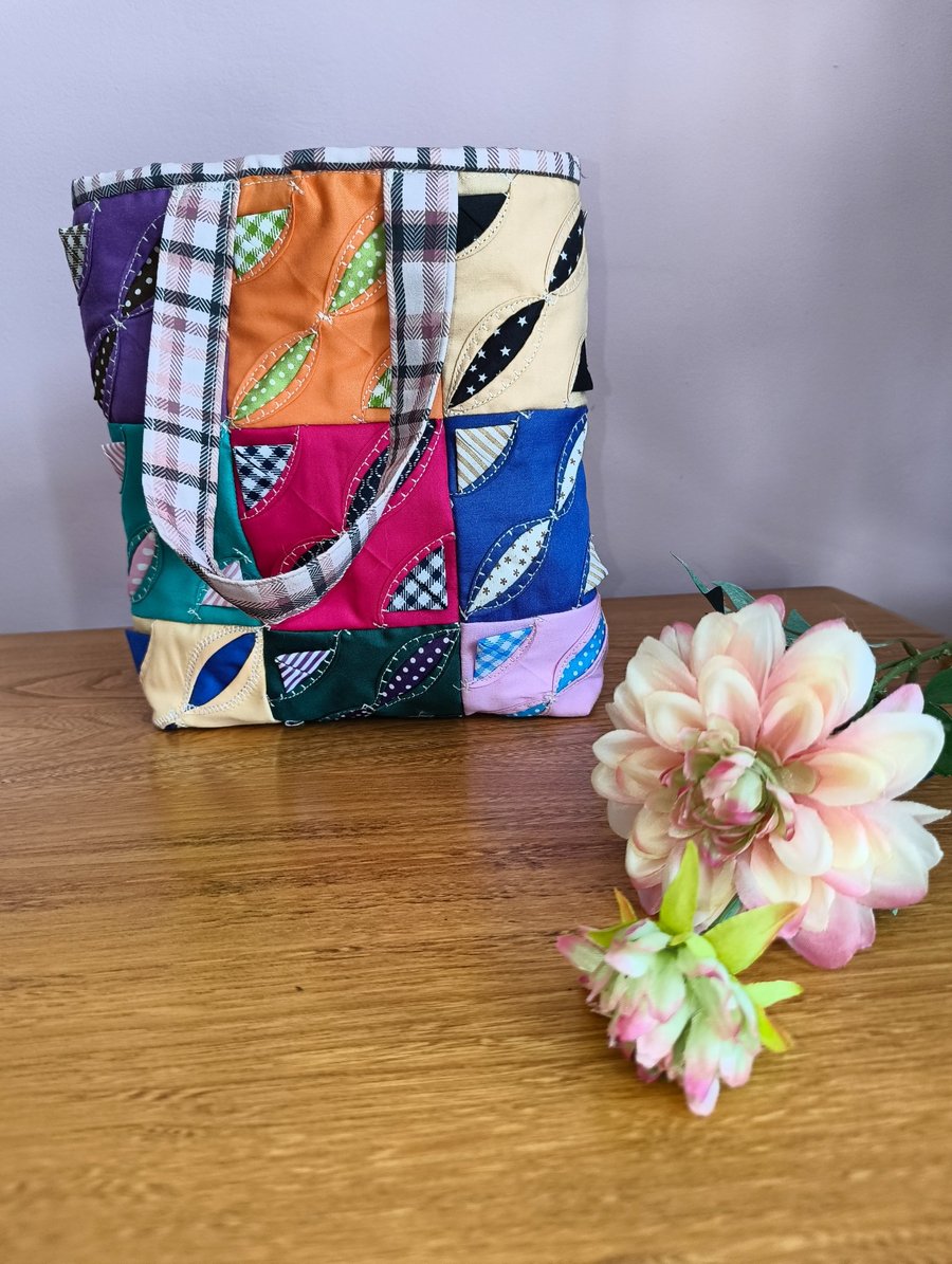Bright and bold colourful tote bag with quilted lining and oodles of detail.