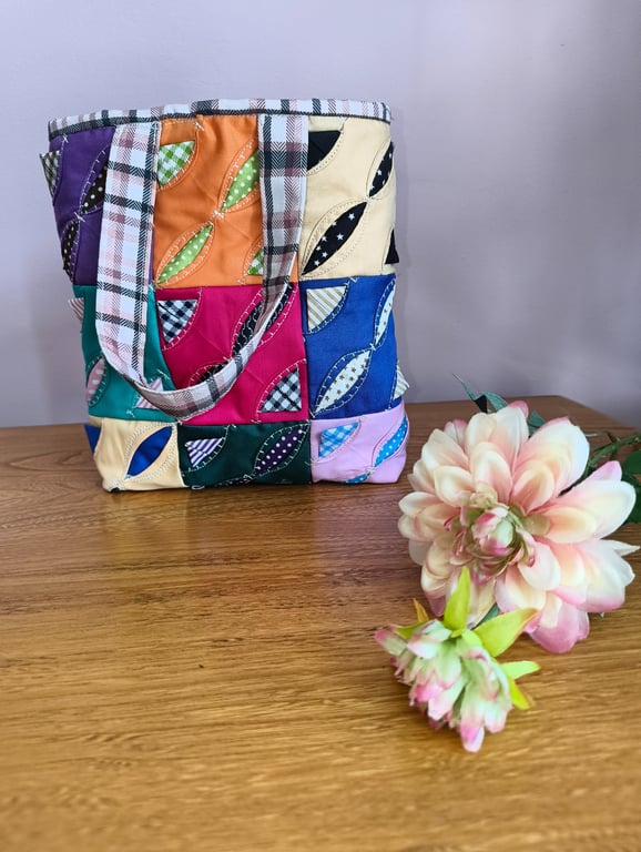 Bright and bold colourful tote bag with quilted lining and oodles of detail.