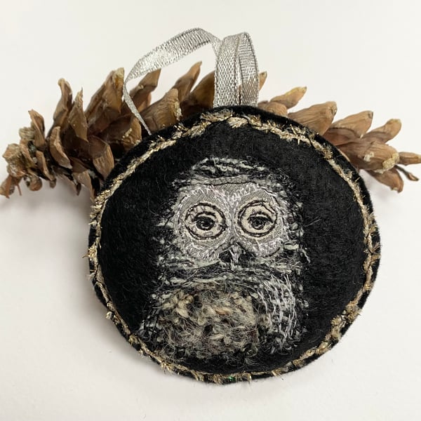 Upcycled embroidered owl in a tree home decoration. 