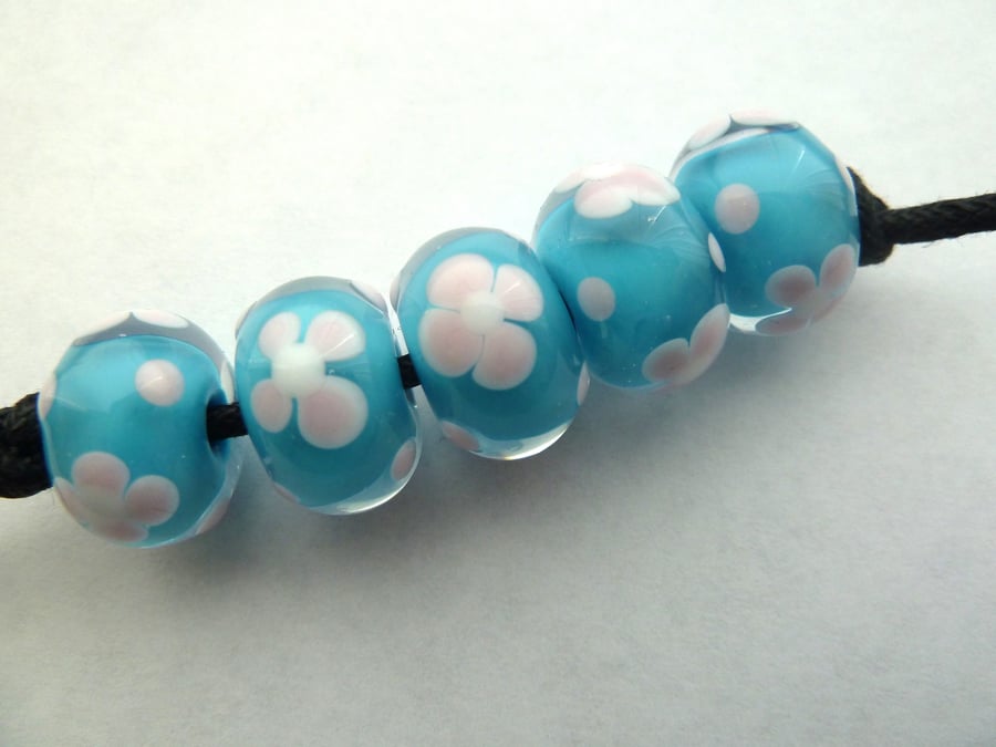 blue and pink flower lampwork beads