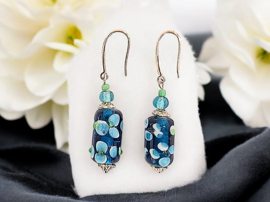 Beautiful blue floral lampwork beaded earrings, very elegant with stirring silve