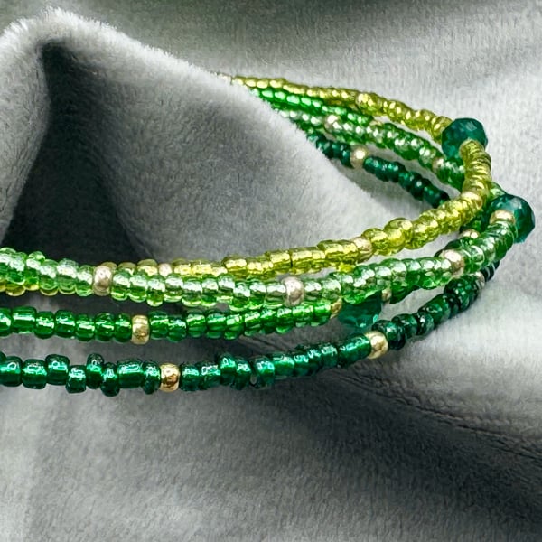 Green glass multi strand seed bead bracelet