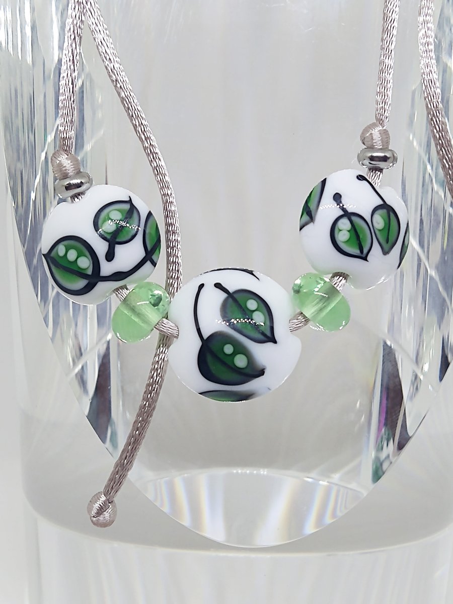 Turning leaf necklace handmade glass beads