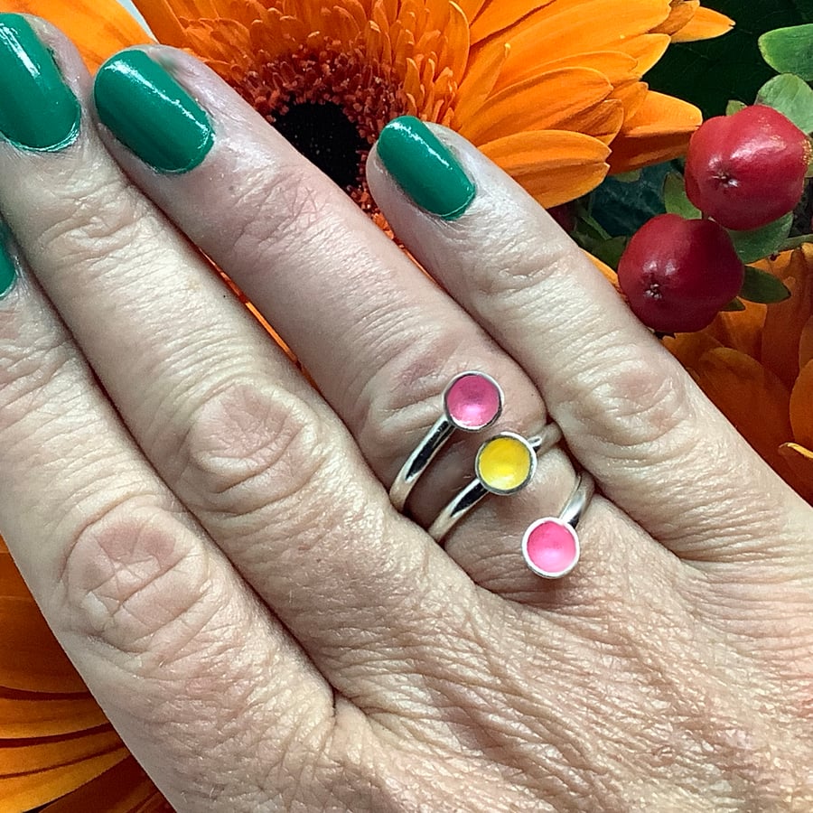 Sterling silver neon pink and orange enamel adjustable wrap ring.