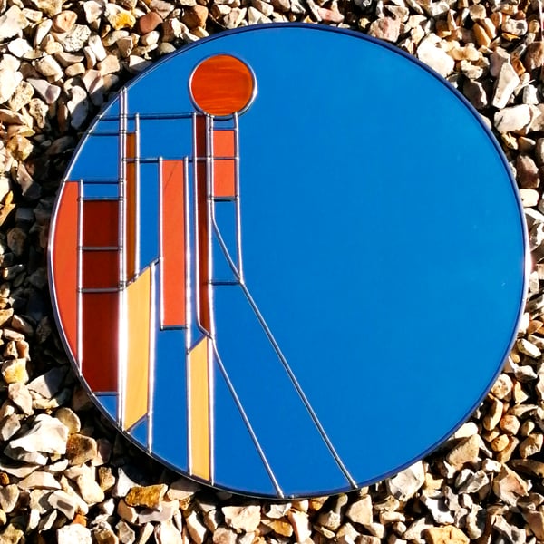 Geometric Twist is an Art Deco Stained Glass Effect Wall Mirror 40cm