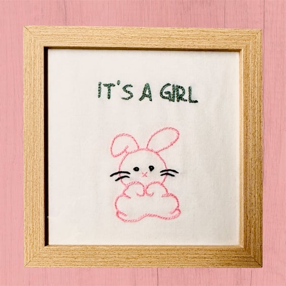 Baby girl gift, picture of a cute pink bunny rabbit and it’s a girl, embroidered