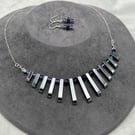 Haematite and purple Swarovski crystal fan necklace and earring set