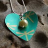 Dragonfly heart pendant in green and yellow