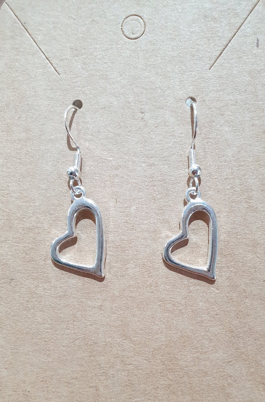 Silver-Plated Hollow Heart Earrings on 925 Silver-Plated Ear Wires