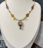 Vintage-Inspired Floral Vase Pendant and Multicolour Beaded Necklace - Image 3
