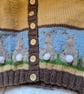 Handknit fairisle children's cardigan with pom pom bunnies - Image 4