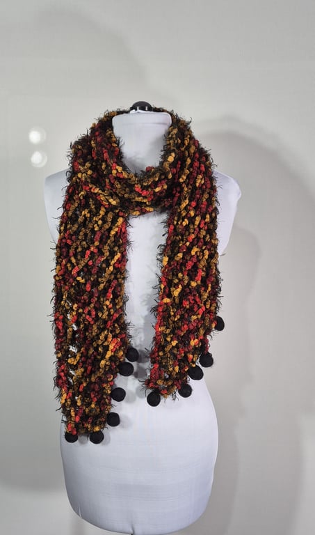 19.Long Thin Handknitted Scarf in Black Orange And Red With Hand Felted Balls.