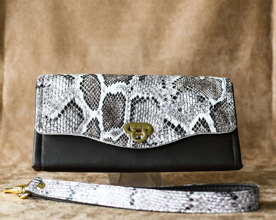 Faux leather and faux snakeskin clutch purse wallet