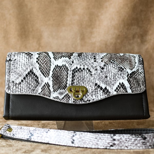 Faux leather and faux snakeskin clutch purse wallet