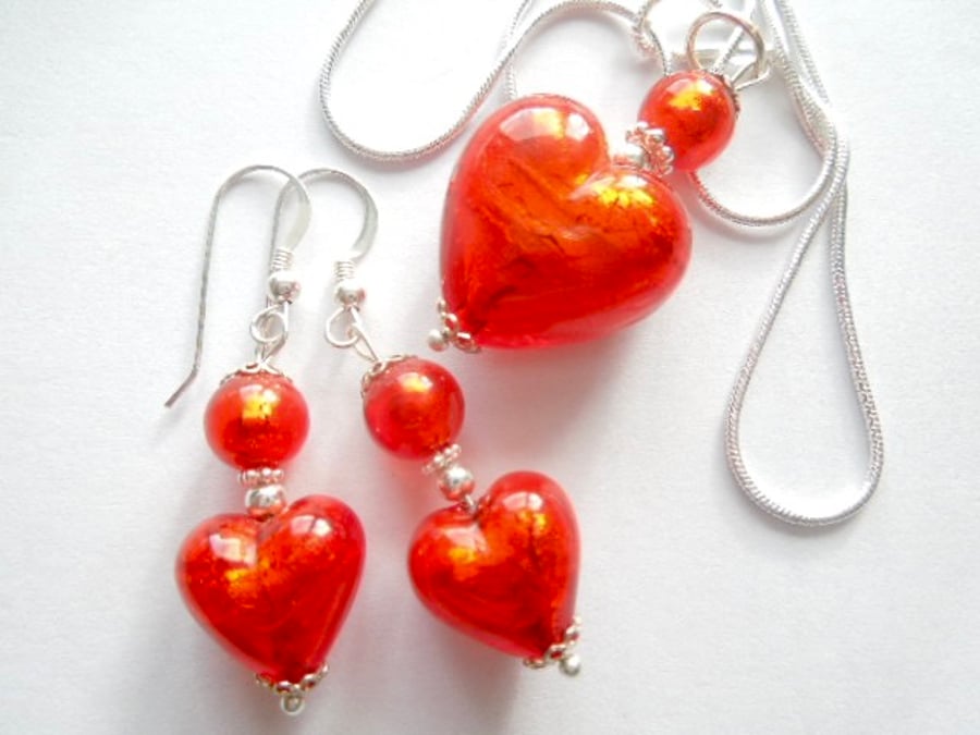 Murano glass red pendant and earrings set with sterling silver.