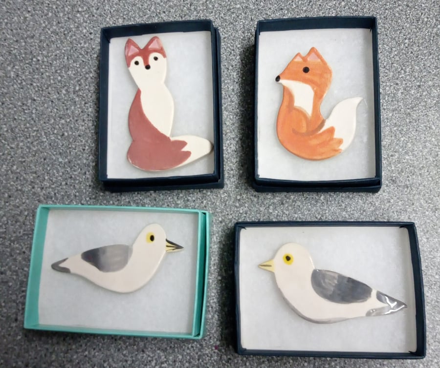 Order for fox and seagull brooch