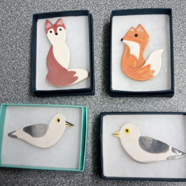 Order for fox and seagull brooch