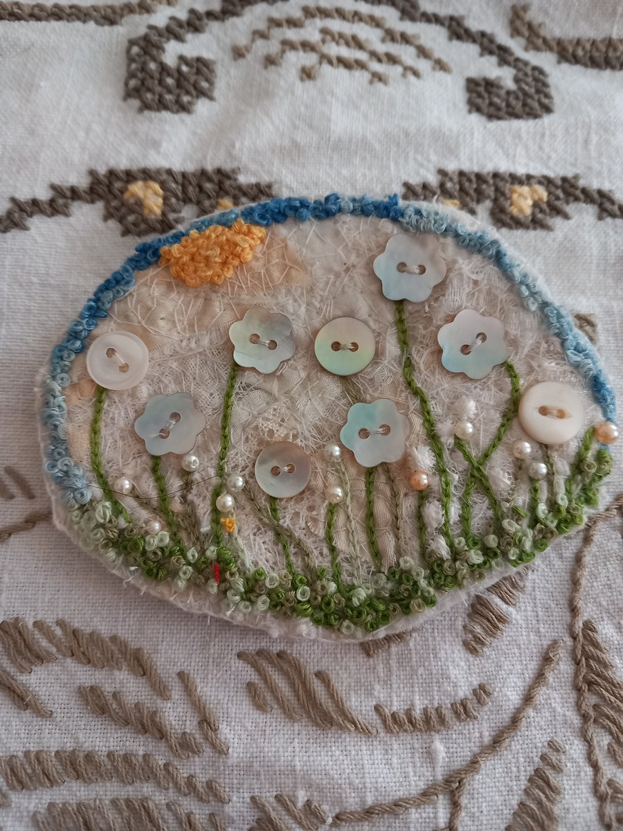 Flowers under the sun - a large textile brooch 