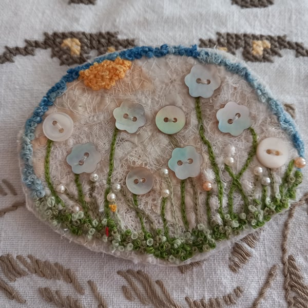Flowers under the sun - a large textile brooch 