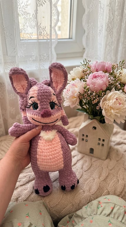 For Folksy, I'd use:  Handmade Crochet Angel Plush – Pink Stitch-Inspired Amigur