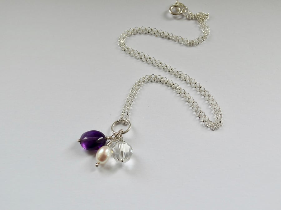 Amethyst and pearl charm cluster pendant