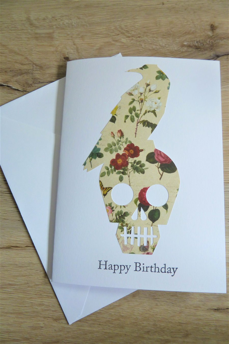 raven on a skull happy birthday card