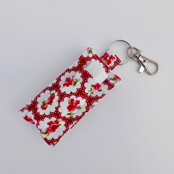 Key ring lip balm holder in red floral fabric keyring 