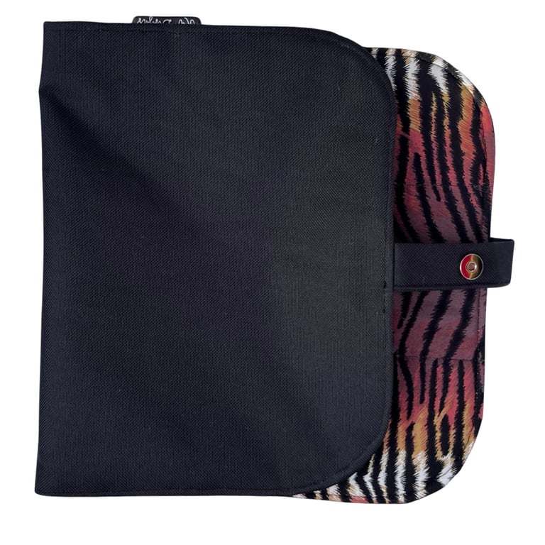 Sit mats , waterproof black back, tiger print.